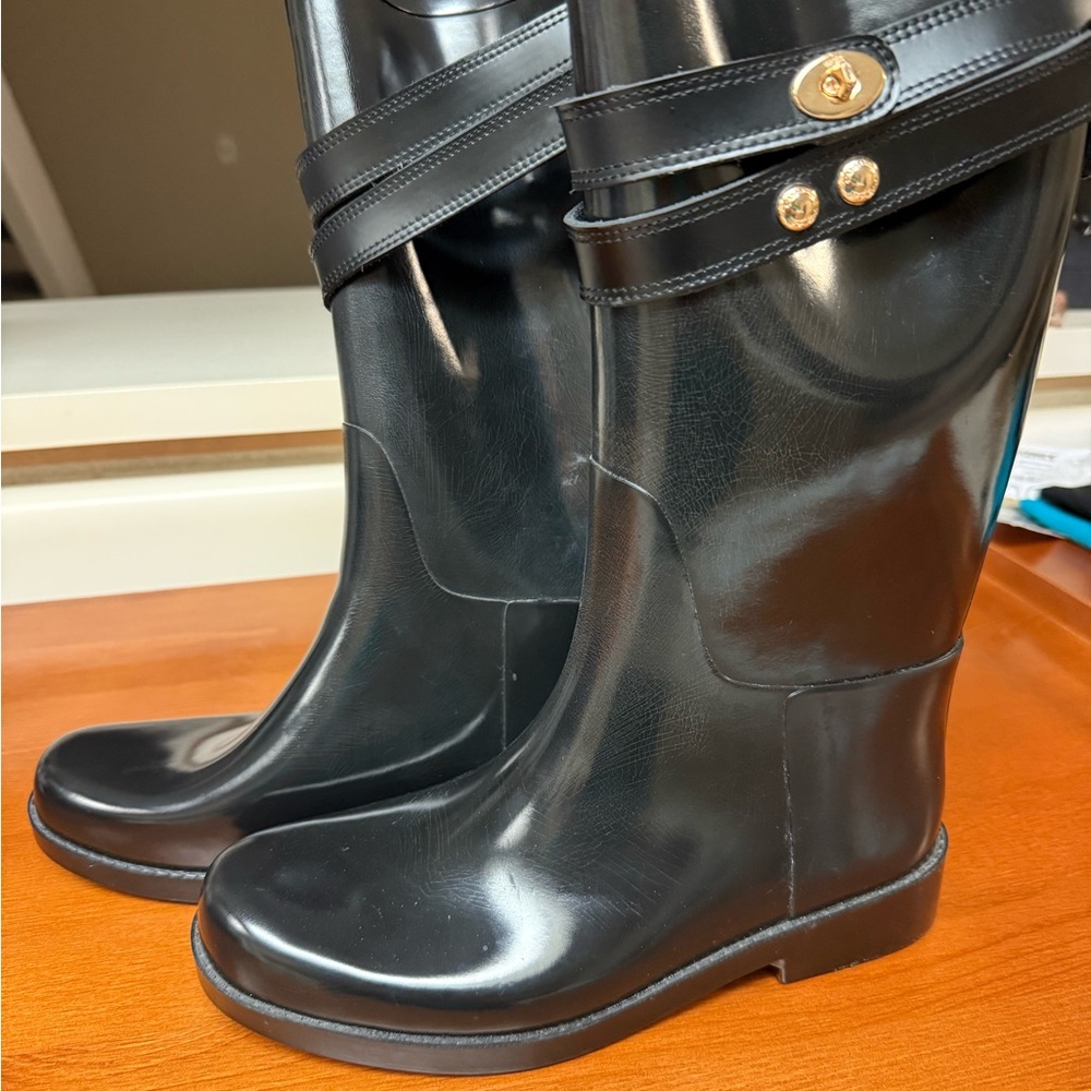 Coach Black Interior with Gold Logo